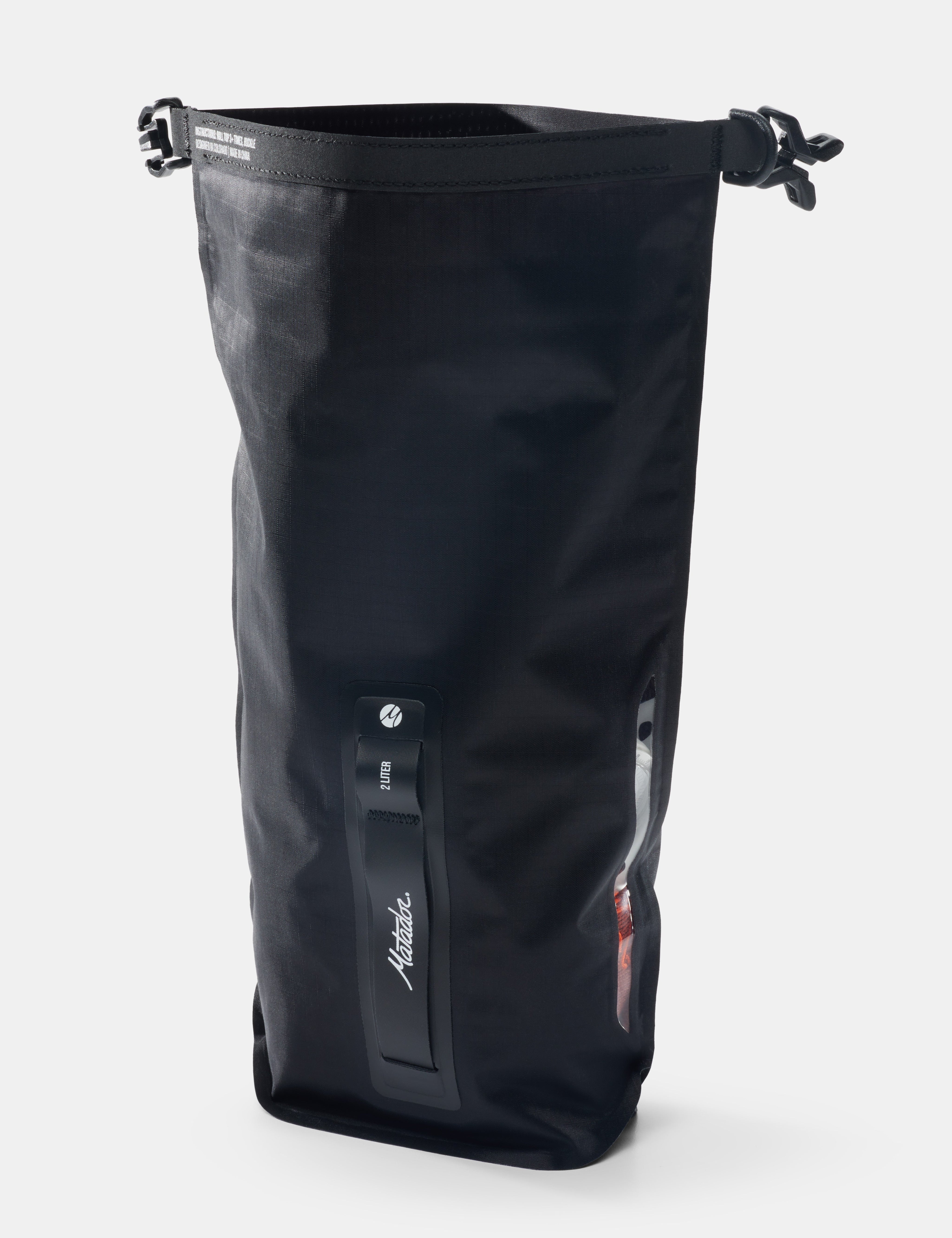 Black dry bag with a visible brand logo on a white background