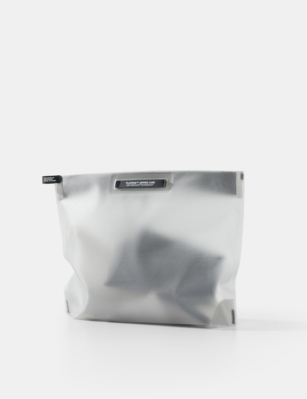 white toiletry case on white background