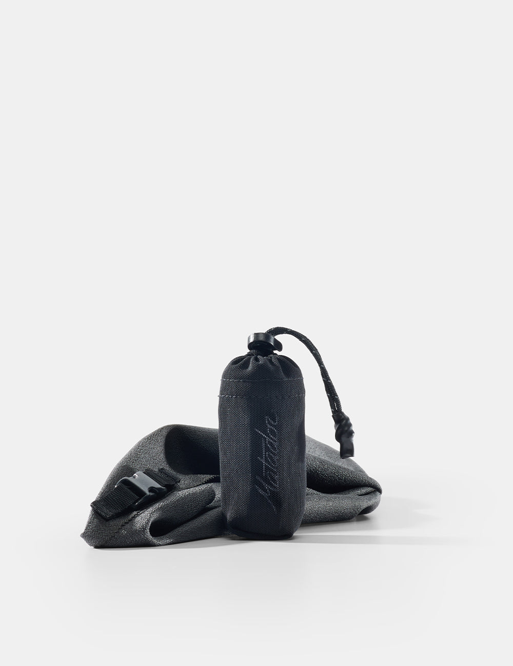 gray towel and pouch on a white background